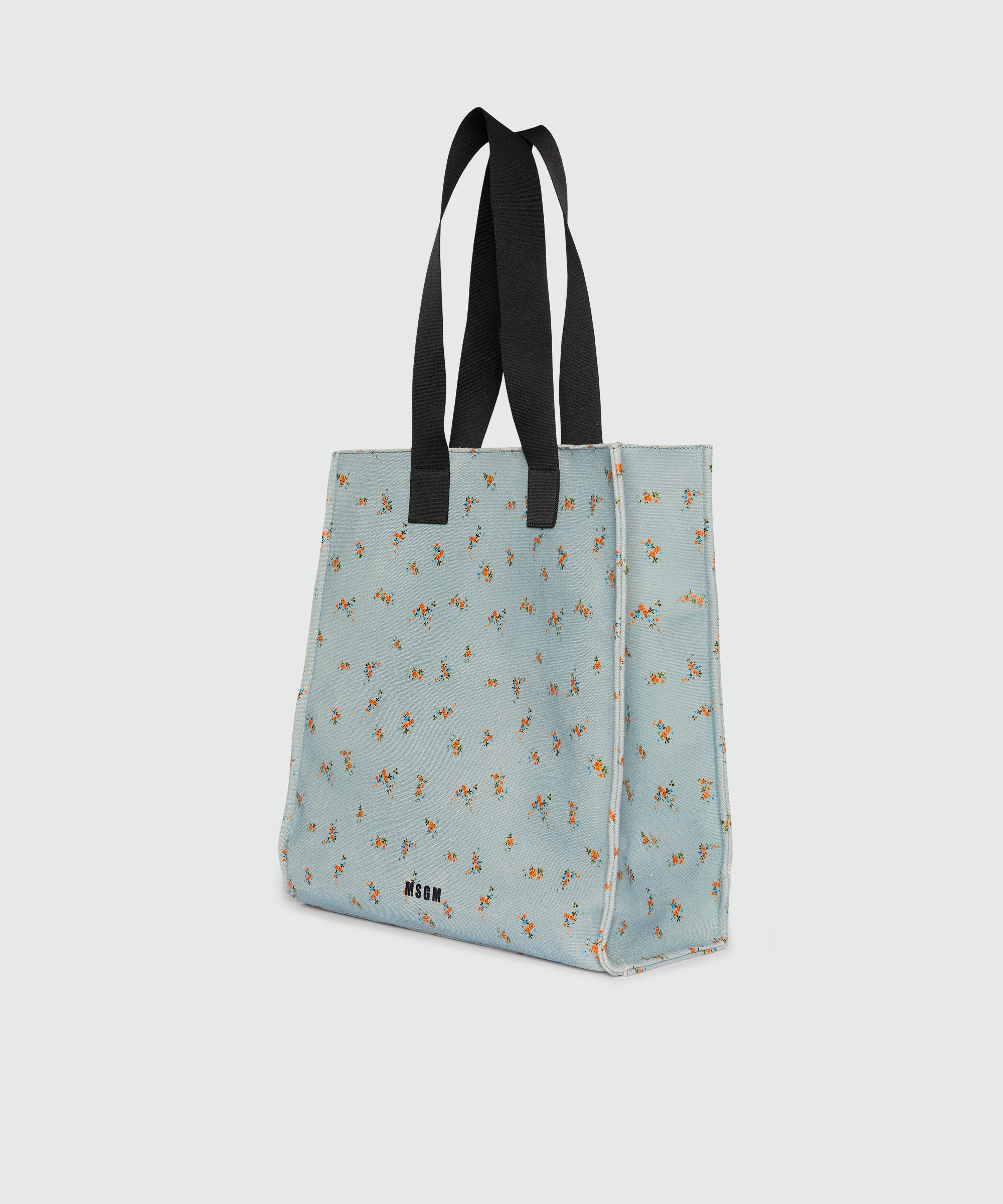 Light blue canvas tote with print and contrasting handles - Image 3